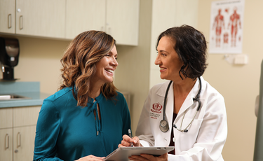 image of doctor with happy patient