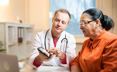 image od doctor with elderly patient