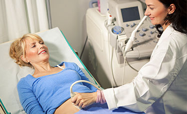 Female patient being examined by her doctor