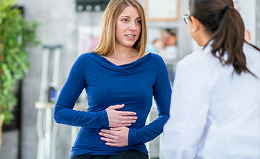 Female patient being examined by her doctor 